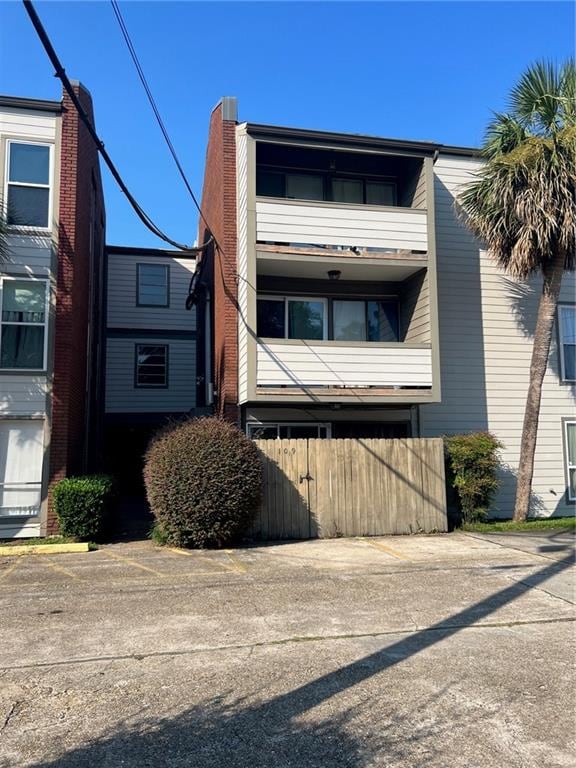 view of front of home with a balcony