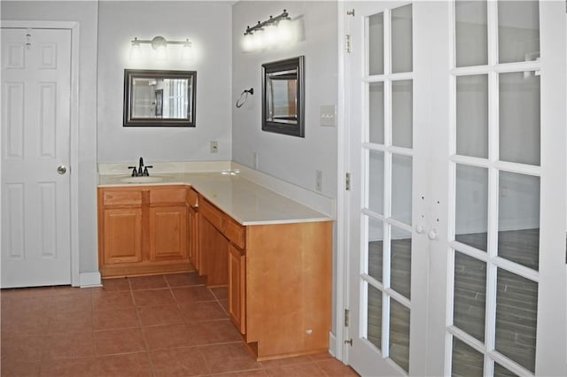 bathroom featuring vanity and tile patterned flooring