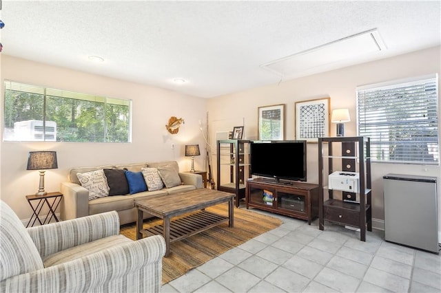 living room with light tile patterned flooring