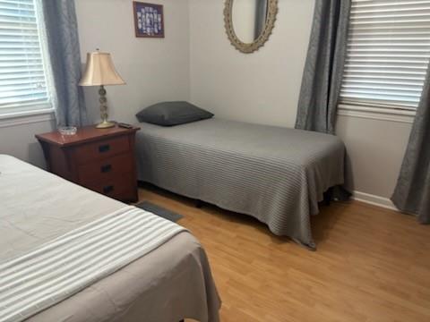 bedroom featuring light wood-type flooring