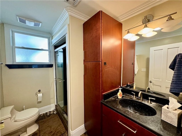 bathroom featuring toilet, ornamental molding, walk in shower, and vanity