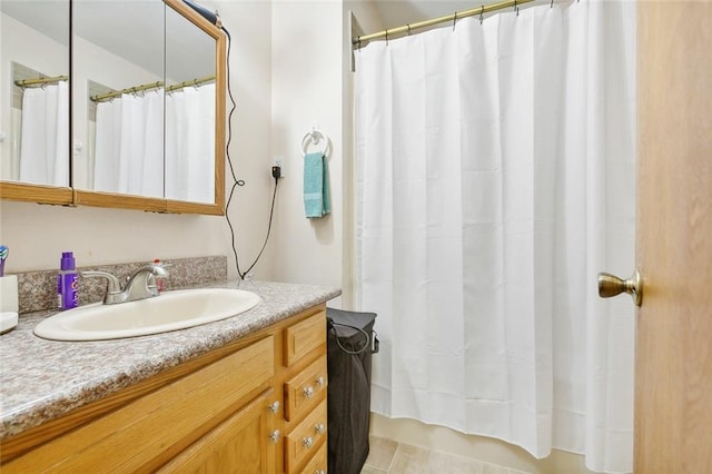 bathroom with vanity and a shower with curtain