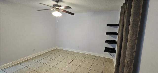 4218 Hessmer Ave Unit 112, Metairie, LA 70002 - empty room with ceiling fan and light tile patterned floors