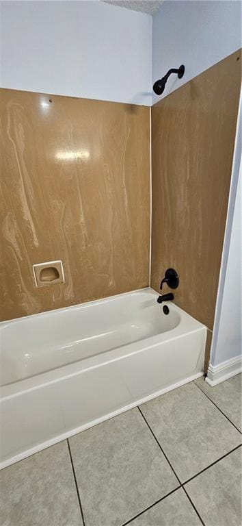 4218 Hessmer Ave Unit 112, Metairie, LA 70002 - full bath featuring bathing tub / shower combination and tile patterned flooring