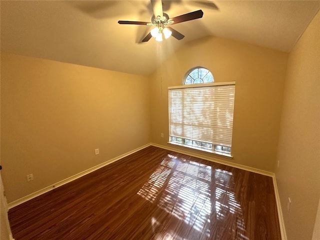 unfurnished room featuring hardwood / wood-style flooring, vaulted ceiling, and ceiling fan