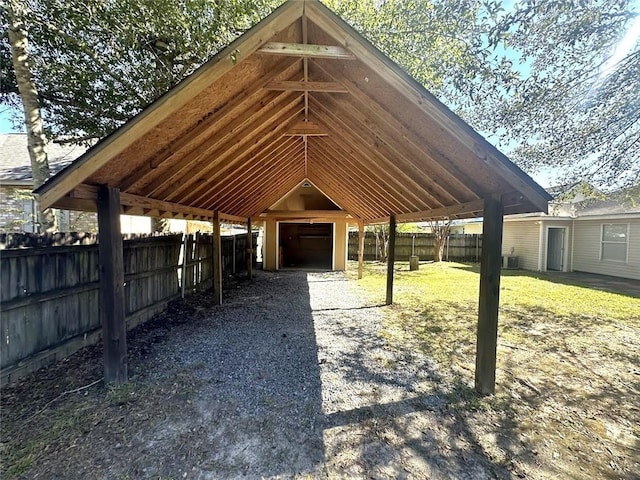 view of home's community with an outdoor structure