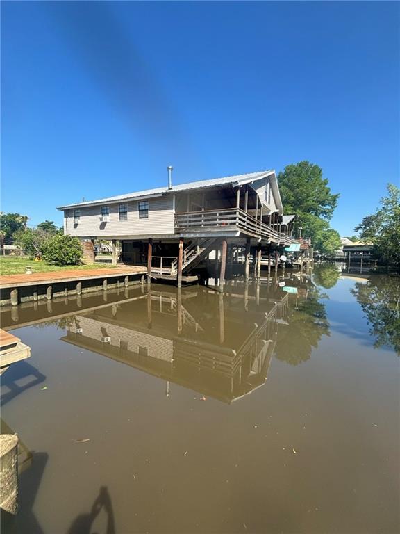 20442 Johnson Dr, Springfield, LA 70462 - view of dock with a water view