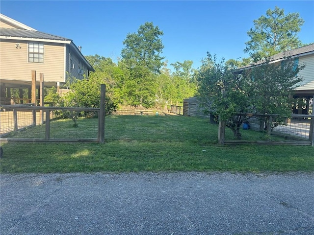 20442 Johnson Dr, Springfield, LA 70462 - view of yard with fence
