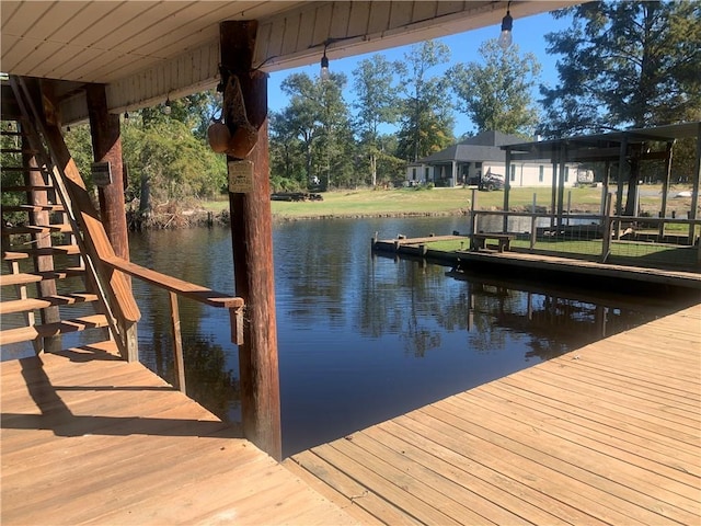 20442 Johnson Dr, Springfield, LA 70462 - view of dock with stairs and a water view