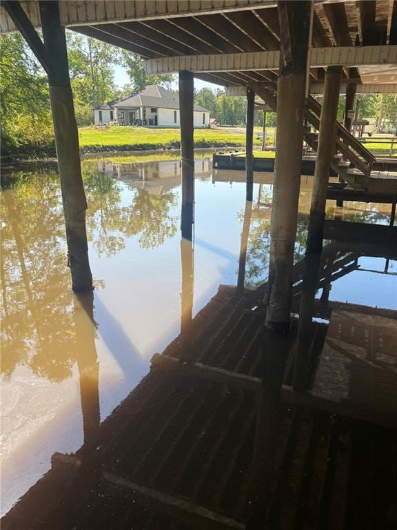 view of dock with a water view