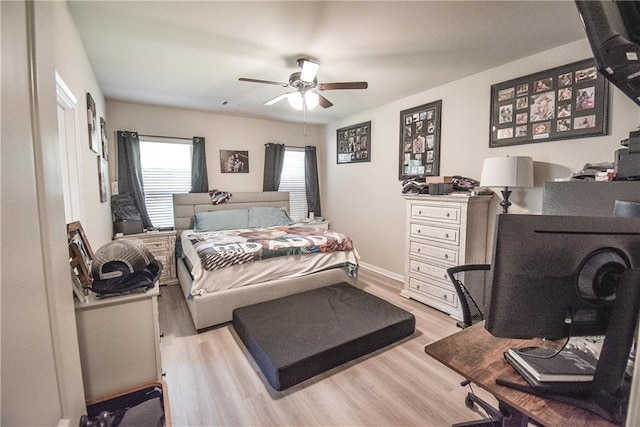 bedroom featuring light hardwood / wood-style flooring and ceiling fan