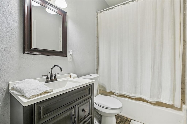 2437 Dumaine St, New Orleans, LA 70119 - full bathroom with vanity, a textured wall, shower / bathtub combination with curtain, and wood finished floors