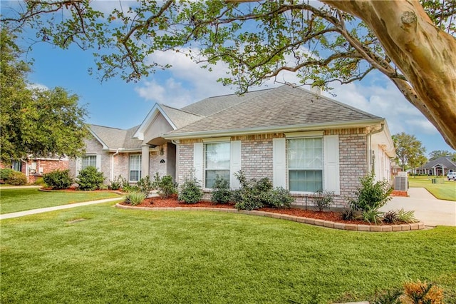 ranch-style house with a front lawn