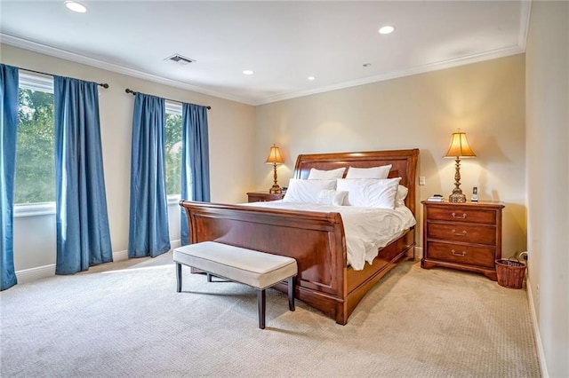 bedroom featuring ornamental molding and light carpet