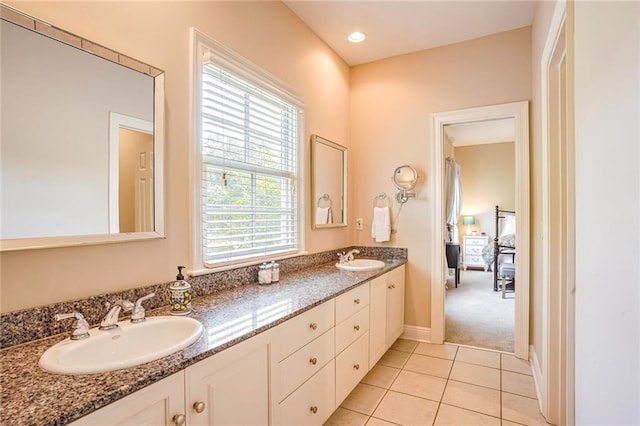 bathroom featuring tile patterned floors and vanity