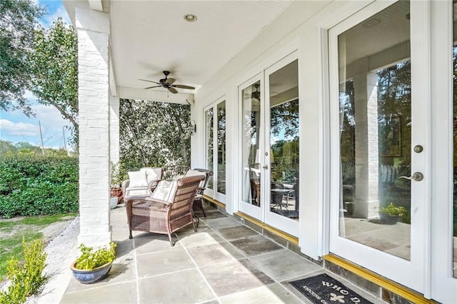 view of patio / terrace with french doors and ceiling fan