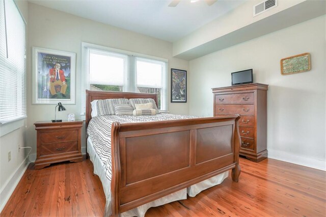 561214 Woodlawn Pl, New Orleans, LA 70124 - bedroom featuring light wood-style floors, baseboards, and ceiling fan