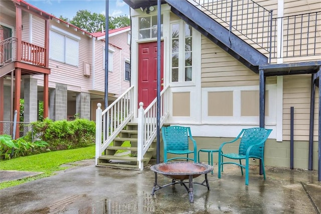 entrance to property with a balcony