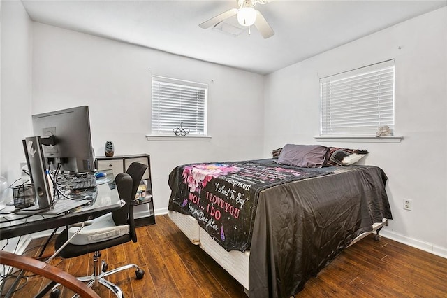 bedroom featuring dark hardwood / wood-style floors and ceiling fan