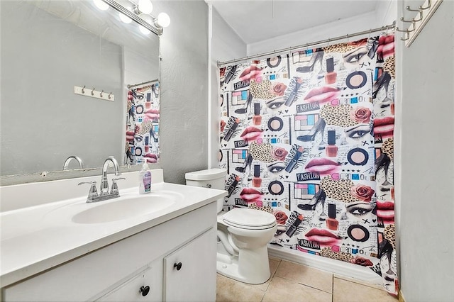 bathroom featuring toilet, a shower with curtain, vanity, and tile patterned flooring