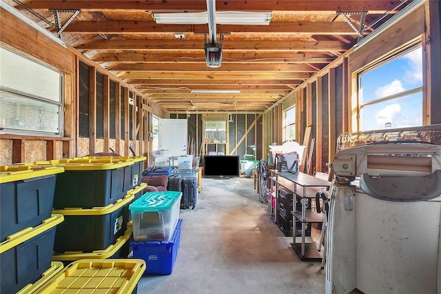 miscellaneous room featuring plenty of natural light and concrete flooring