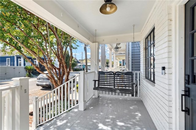 view of patio with a porch and ceiling fan