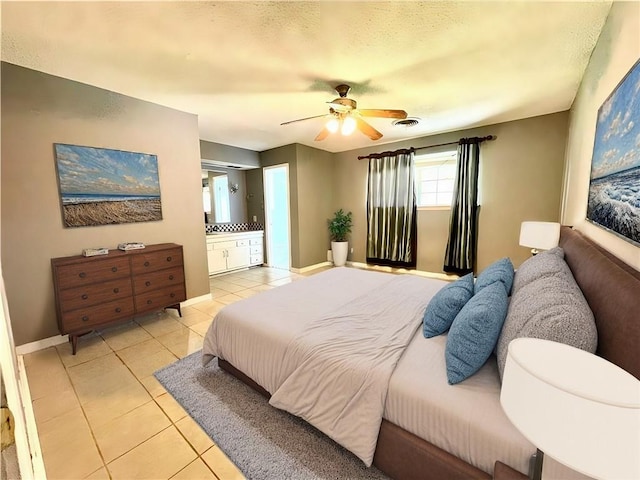 bedroom featuring light tile patterned floors and ceiling fan