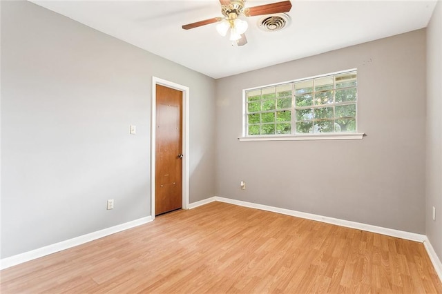 unfurnished room with ceiling fan and light hardwood / wood-style floors