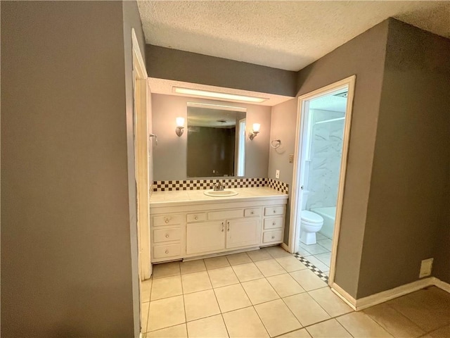 full bathroom featuring vanity, tile patterned floors, decorative backsplash, toilet, and a textured ceiling