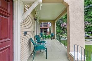 balcony featuring a porch