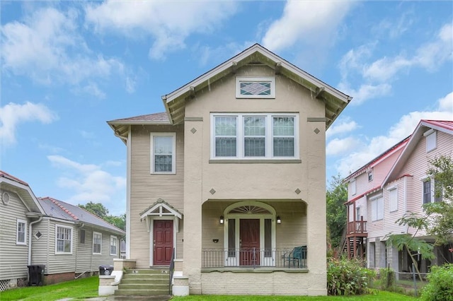 5612 Woodlawn Pl, New Orleans, LA 70124 - view of front of home featuring stucco siding and a front lawn