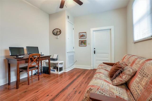5612 Woodlawn Pl, New Orleans, LA 70124 - home office with a ceiling fan, wood finished floors, and baseboards