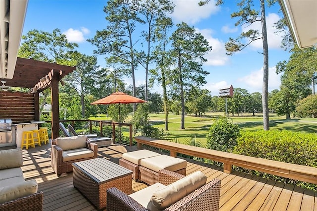 deck featuring outdoor lounge area, a yard, and a pergola