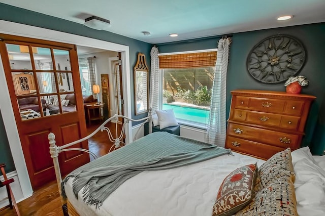 bedroom featuring hardwood / wood-style floors