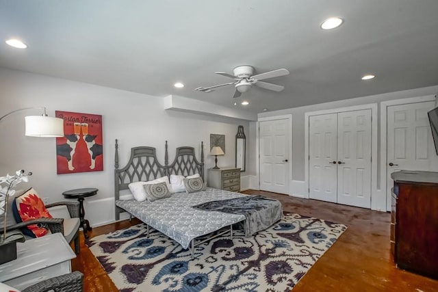 bedroom featuring ceiling fan and dark wood-type flooring