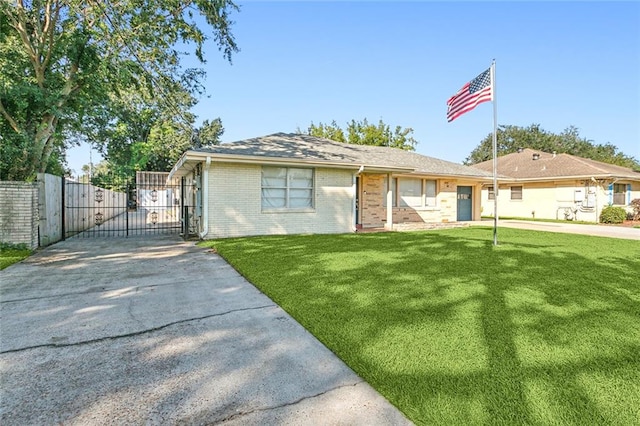 ranch-style home featuring a front yard