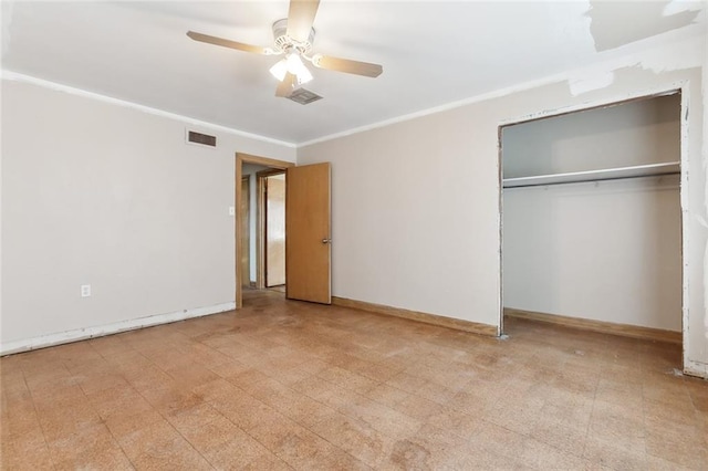 unfurnished bedroom featuring ornamental molding, a closet, and ceiling fan