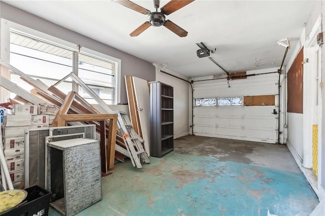 garage featuring a garage door opener and ceiling fan