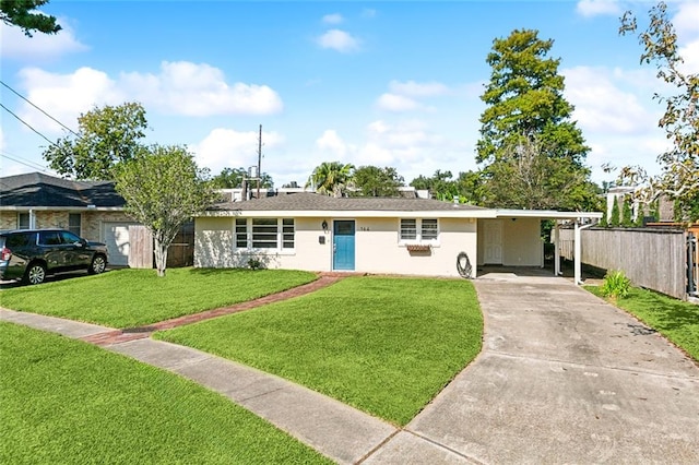 single story home with a front yard and a carport