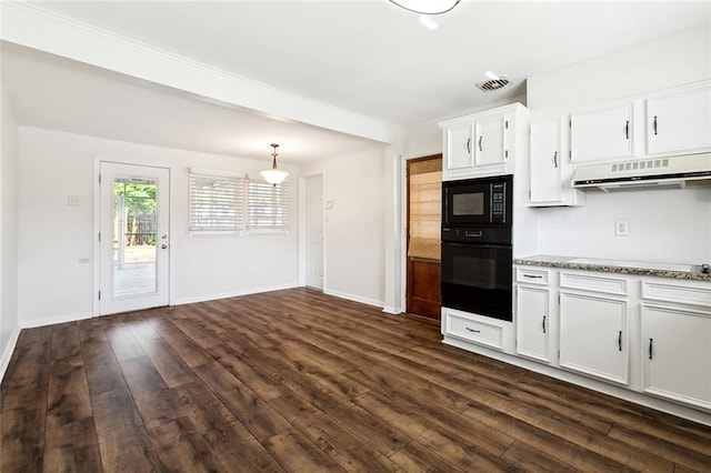 kitchen with white cabinetry, black appliances, and dark hardwood / wood-style flooring