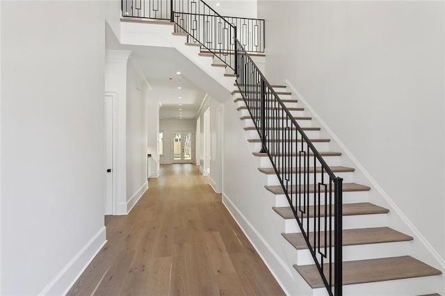 stairway with wood-type flooring