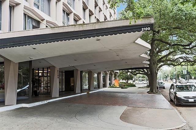 exterior space featuring a carport