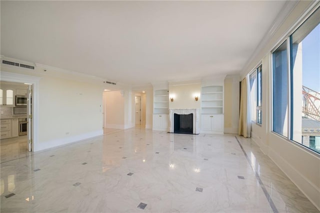 unfurnished living room featuring built in features