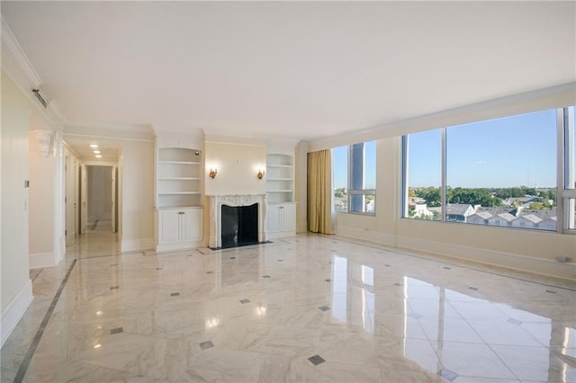 unfurnished living room featuring ornamental molding and built in features