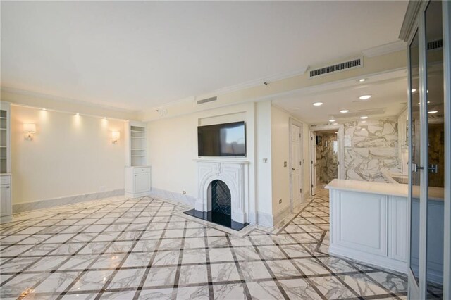 bathroom featuring toilet, a shower with shower door, and tile walls