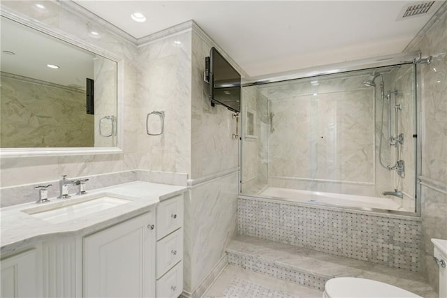 full bathroom with vanity, toilet, tile patterned floors, and enclosed tub / shower combo