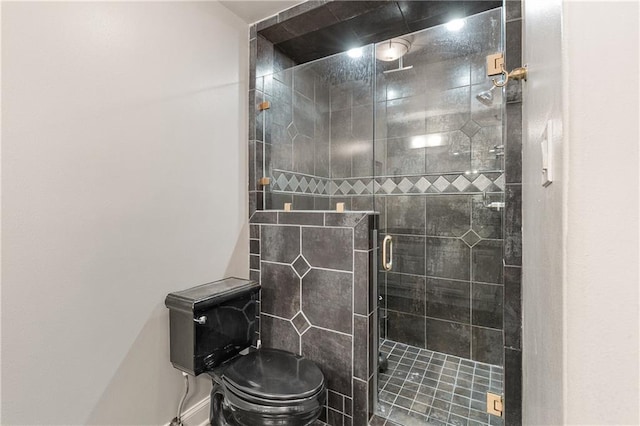 bathroom with toilet and walk in shower