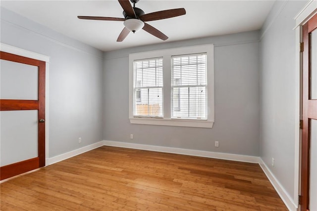 unfurnished room with light hardwood / wood-style flooring and ceiling fan