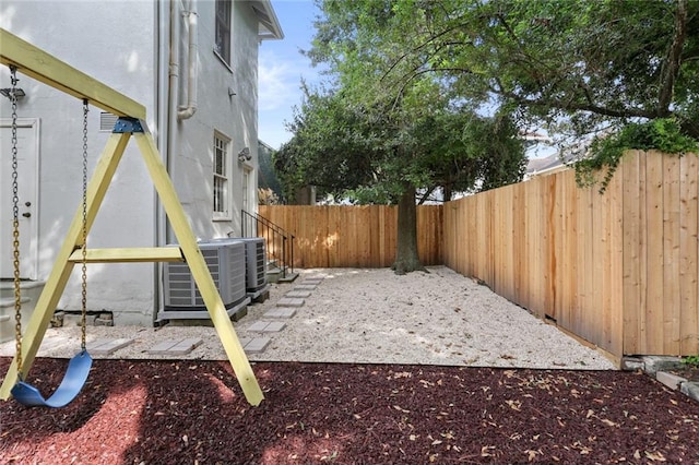 view of yard featuring central AC unit