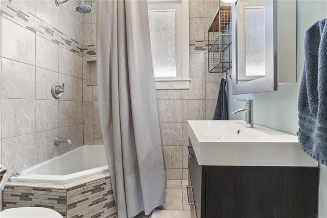 bathroom with vanity, shower / tub combo with curtain, and tile patterned flooring